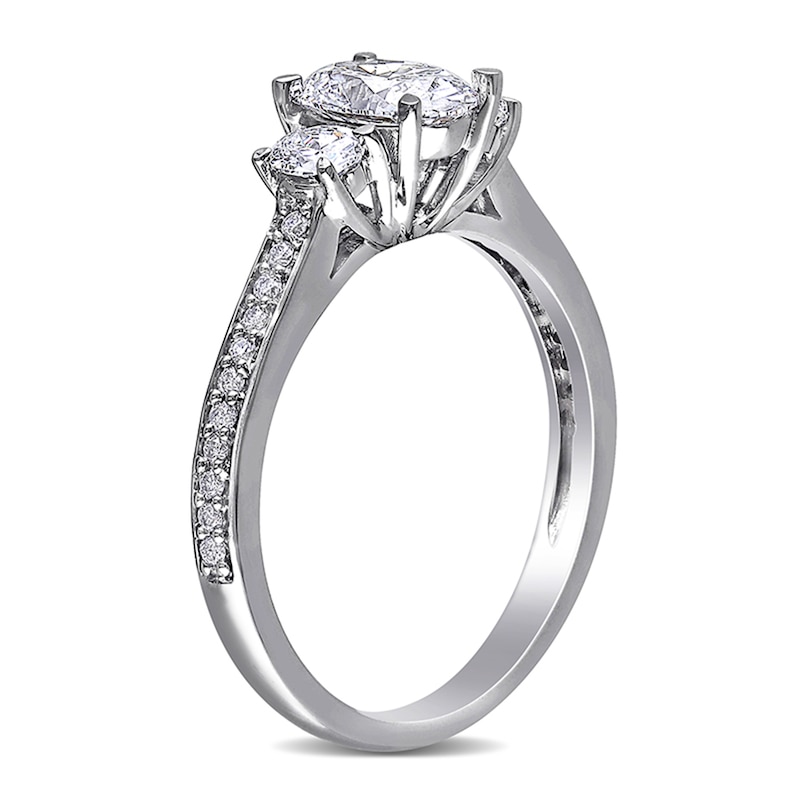 1.10 CT. T.W. Oval Diamond Three Stone Engagement Ring in 14K White Gold