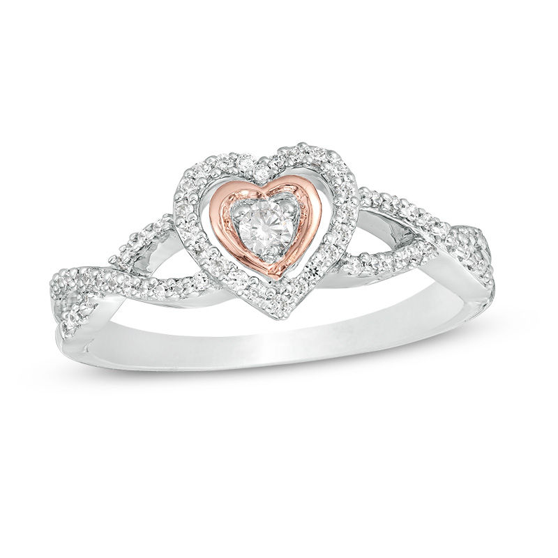 Peoples 0.23 CT. T.W. Diamond Double Heart Twist Ring in Sterling