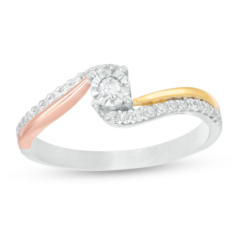 0.23 CT. T.W. Diamond Bypass Ring in 10K Tri-Tone Gold