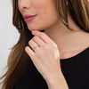 Thumbnail Image 1 of 0.18 CT. T.W. Diamond Double Frame Twist Promise Ring in 10K Gold