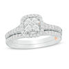 Thumbnail Image 1 of Perfect Fit 0.50 CT. T.W. Quad Diamond Cushion Frame Interlocking Bridal Set in 10K Two-Tone Gold