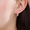 Thumbnail Image 2 of 0.18 CT. T.W. Diamond Bezel-Set Crossover Hoop Earrings in 10K Two-Tone Gold
