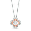0.33 CT. T.W. Certified Canadian Diamond Clover Pendant in 10K Two-Tone Gold (I/I2)