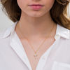 Thumbnail Image 2 of 0.115 CT. T.W. Diamond Eight-Point Star Pendant in 10K Gold