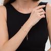 Thumbnail Image 1 of 0.58 CT. T.W. Diamond Alternating Infinity Bolo Bracelet in 10K Gold - 9.5"