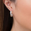 Thumbnail Image 1 of 0.45 CT. T.W. Diamond Double Row Twist Hoop Earrings in 10K Two-Tone Gold