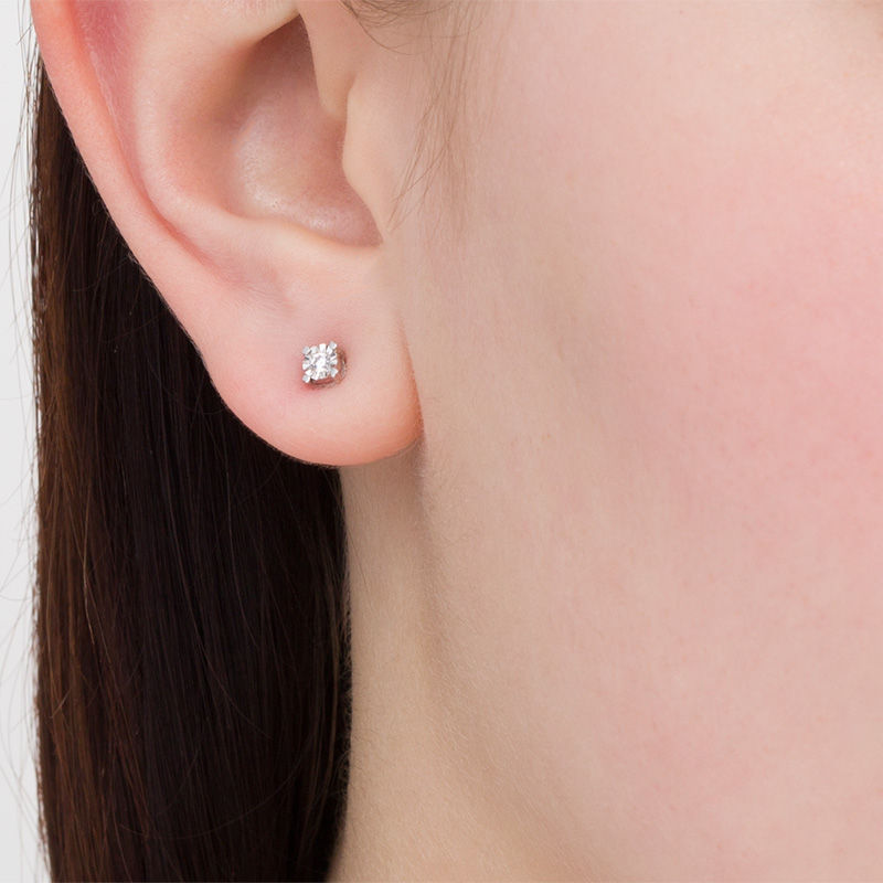 Main Image 2 of 0.085 CT. T.W. Diamond Solitaire Stud Earrings in 10K White Gold