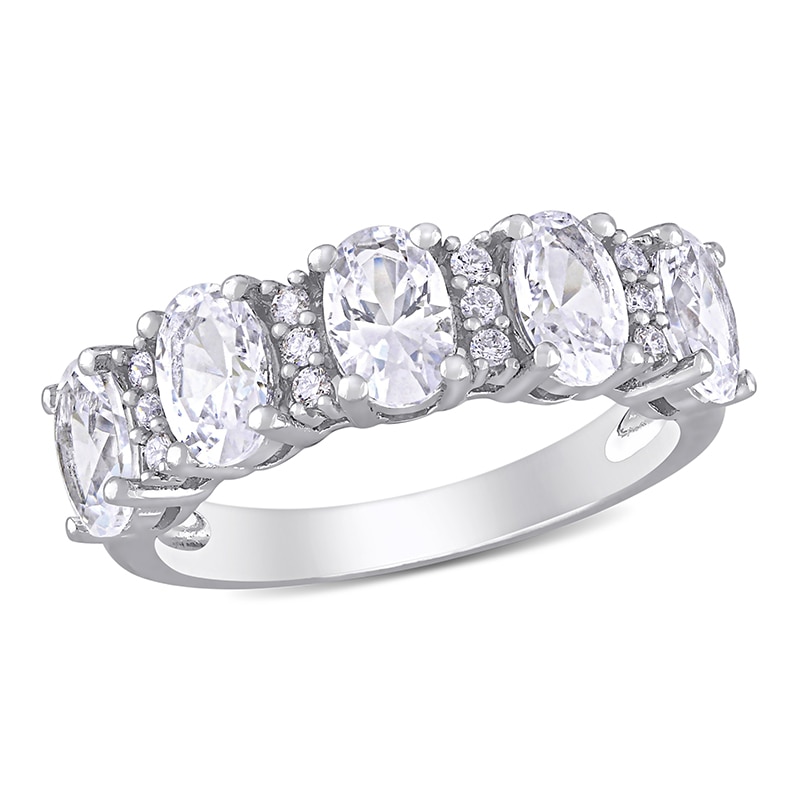 Oval Lab-Created White Sapphire and 0.10 CT. T.W. Diamond Five Stone Ring in 10K White Gold