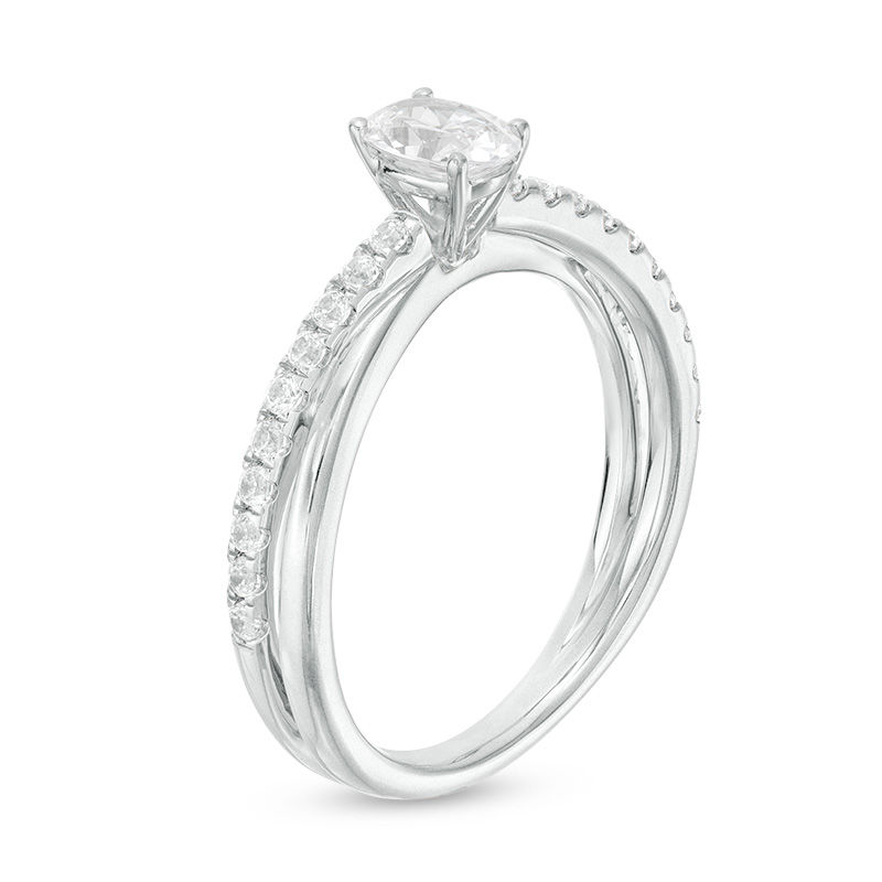 0.70 CT. T.W. Oval Diamond Crossover Engagement Ring in 14K White Gold