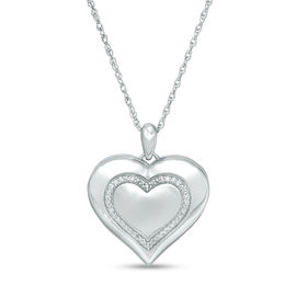 0.067 CT. T.W. Diamond Heart with Outline Locket in Sterling Silver