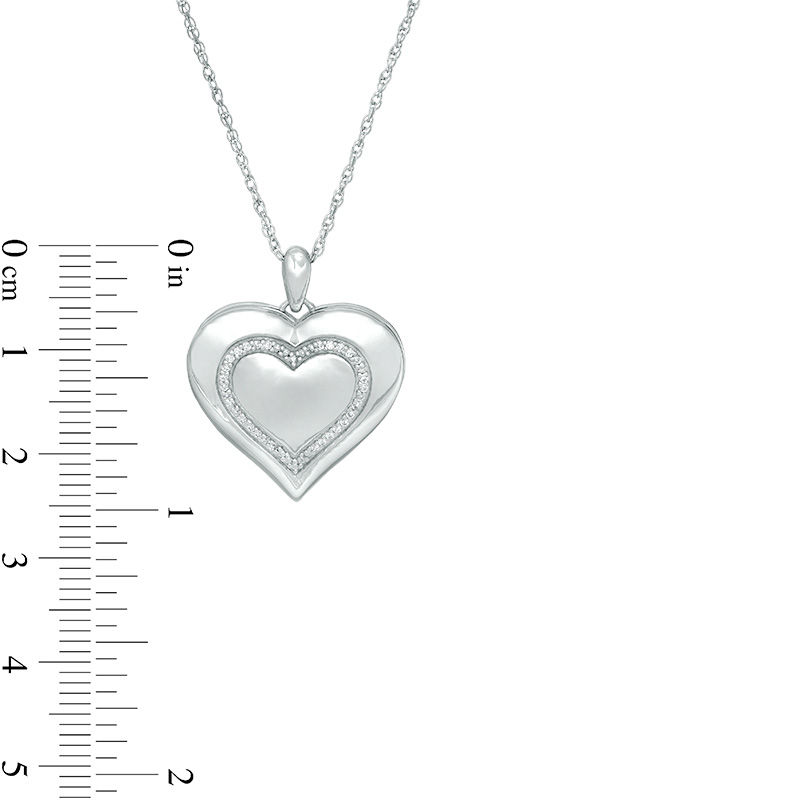 0.067 CT. T.W. Diamond Heart with Outline Locket in Sterling Silver