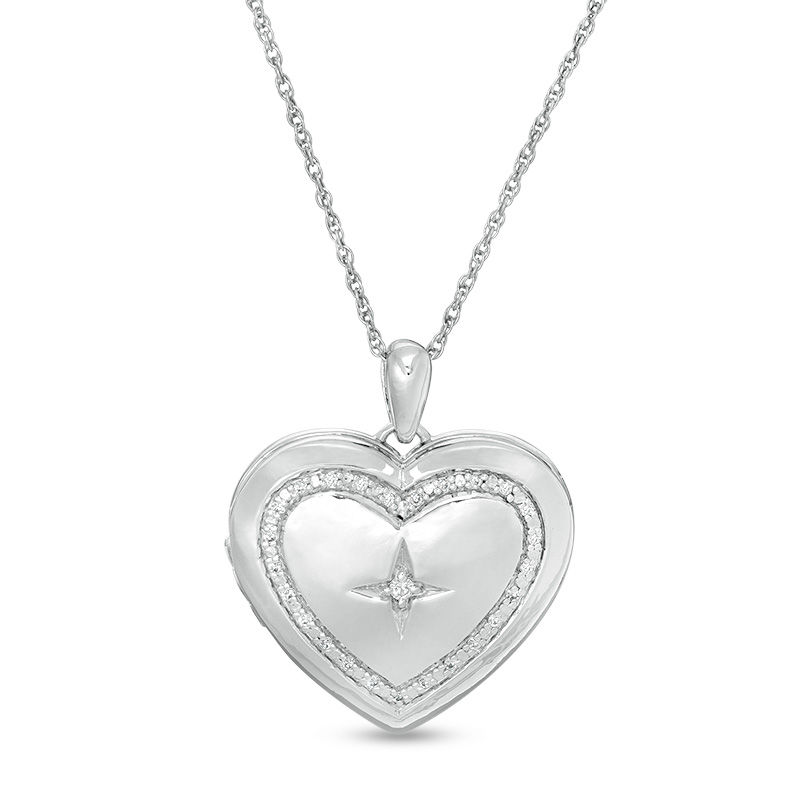 0.085 CT. T.W. Diamond Heart Outline with Star Locket in Sterling Silver