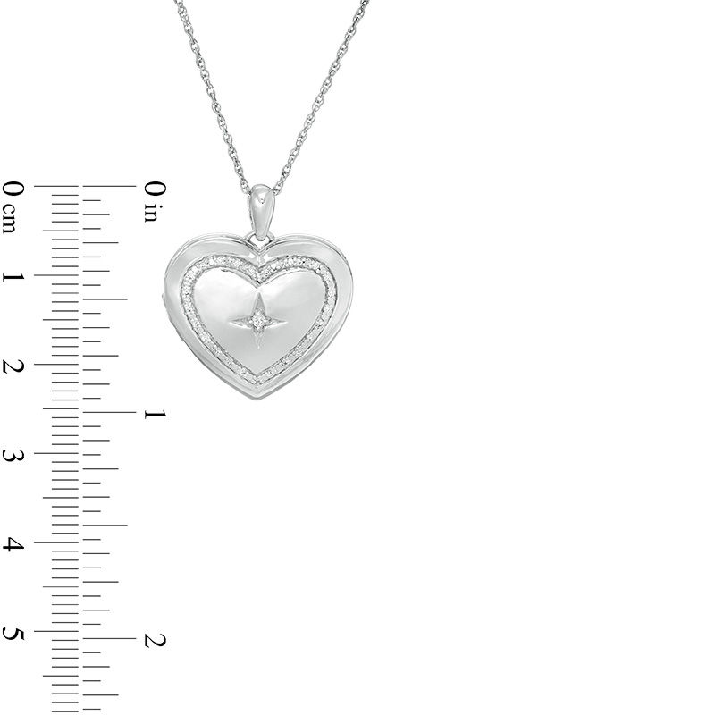 0.085 CT. T.W. Diamond Heart Outline with Star Locket in Sterling Silver