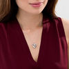 Thumbnail Image 1 of 0.065 CT. T.W. Diamond Ornate Heart Locket in Sterling Silver