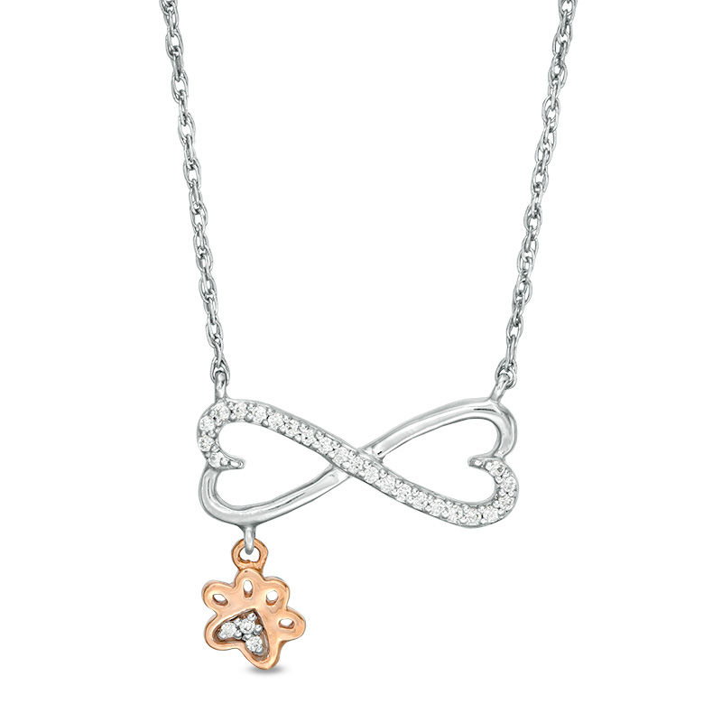 0.067 CT. T.W. Diamond Sideways Heart Infinity with Paw Print Dangle Necklace in Sterling Silver and 10K Rose Gold