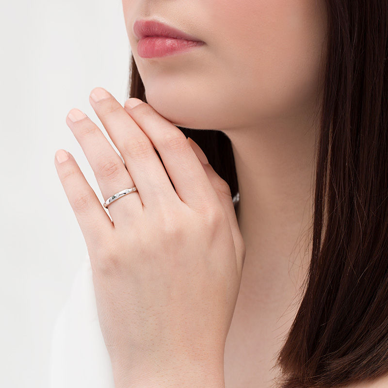 0.18 CT. T.W. Diamond Scattered Wedding Band in Platinum