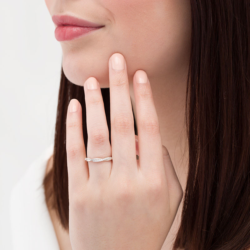 Main Image 2 of 0.09 CT. T.W. Diamond Twist Wedding Band in Platinum