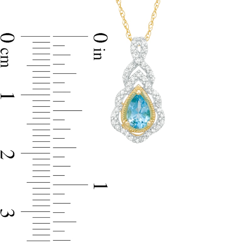 Pear-Shaped Swiss Blue Topaz and 0.15 CT. T.W. Diamond Scallop Frame Ornate Pendant in 10K Gold