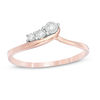 Thumbnail Image 0 of 0.04 CT. T.W. Diamond Three Stone Sweep Bypass Ring in 10K Rose Gold