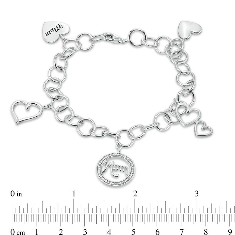 0.11 CT. T.W. Diamond "Mom" and Heart Charm Bracelet in Sterling Silver