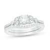 Thumbnail Image 1 of 4.5mm Lab-Created White Sapphire and 0.17 CT. T.W. Diamond Leaf-Sides Vintage-Style Bridal Set in Sterling Silver