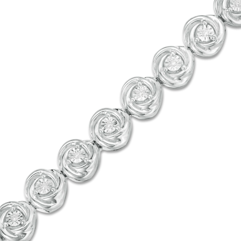 Main Image 1 of 0.086 CT. T.W. Diamond Love Knot Tennis Bracelet in Sterling Silver - 7.5"