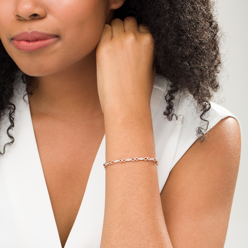 Main Image 2 of 0.18 CT. T.W. Composite Diamond Alternating Marquise and Infinity Bracelet in 10K Rose Gold - 7.25"