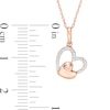 Thumbnail Image 2 of 0.06 CT. T.W. Diamond Tilted Double Heart Pendant in 10K Rose Gold