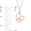 0.06 CT. T.W. Diamond Tilted Double Heart Pendant in 10K Rose Gold
