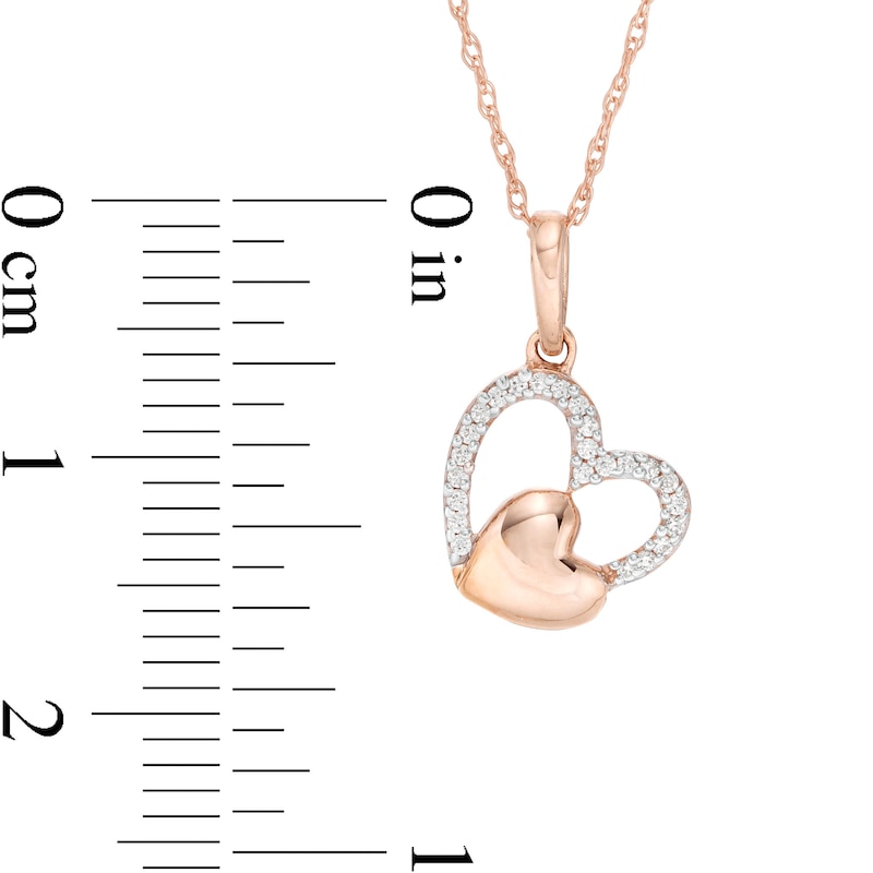 0.06 CT. T.W. Diamond Tilted Double Heart Pendant in 10K Rose Gold