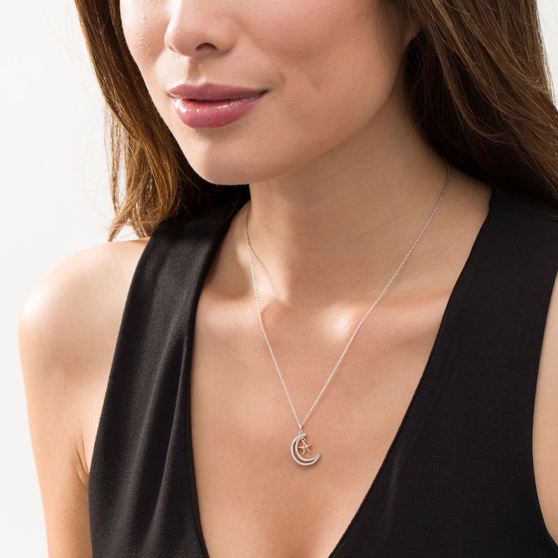 Main Image 2 of 0.065 CT. T.W. Diamond Crescent Moon Outline with Star Pendant in Sterling Silver and 10K Rose Gold