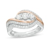 Thumbnail Image 1 of 0.58 CT. T.W. Diamond Three Stone Open Bypass Bridal Set in 10K Two-Tone Gold