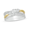 Thumbnail Image 1 of 0.23 CT. T.W. Diamond Three Stone Split Shank Bridal Set in Sterling Silver with 14K Gold Plate