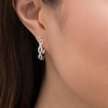 0.23 CT. T.W. Diamond Twist Hoop Earring in 10K White Gold
