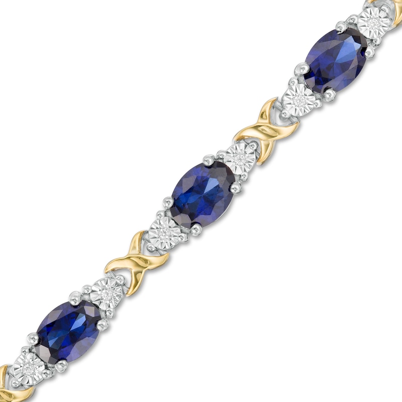 Oval Lab-Created Blue Sapphire and 0.086 CT. T.W. Diamond "X" Bracelet in Sterling Silver and 14K Gold Plate - 7.25"|Peoples Jewellers