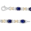 Thumbnail Image 3 of Oval Lab-Created Blue Sapphire and 0.086 CT. T.W. Diamond "X" Bracelet in Sterling Silver and 14K Gold Plate - 7.25"