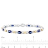 Thumbnail Image 3 of Oval Lab-Created Blue Sapphire and 0.086 CT. T.W. Diamond "X" Bracelet in Sterling Silver and 14K Gold Plate - 7.25"