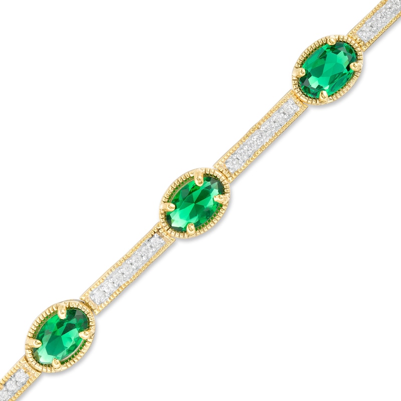 Oval Lab-Created Emerald and White Sapphire Station Bar Bracelet in Sterling Silver with 14K Gold Plate - 7.25"|Peoples Jewellers