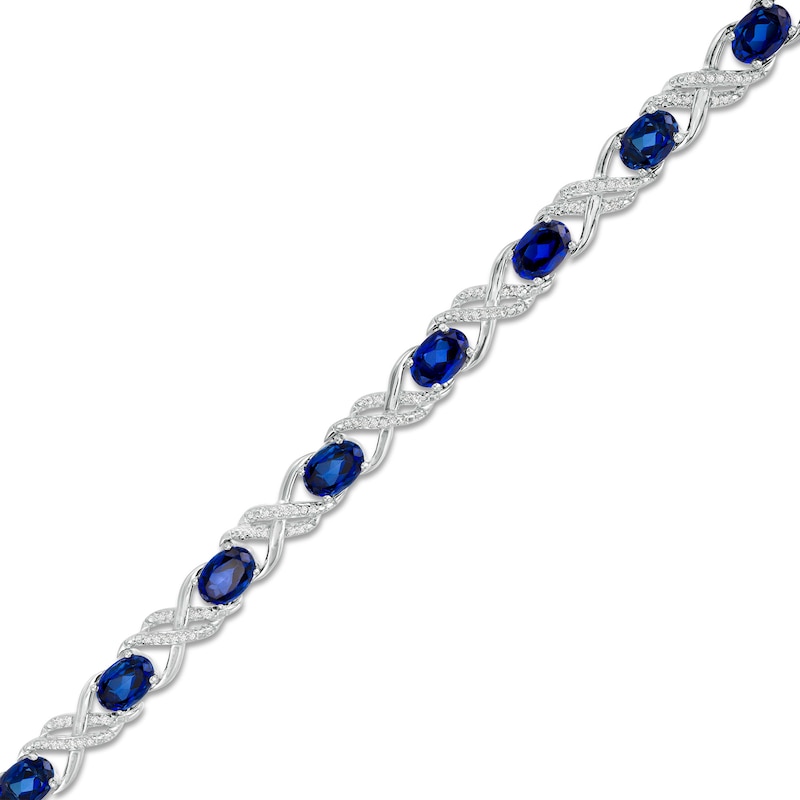 Oval Lab-Created Blue Sapphire and 0.23 CT. T.W. Diamond Double Infinity Bracelet in Sterling Silver - 7.25"|Peoples Jewellers