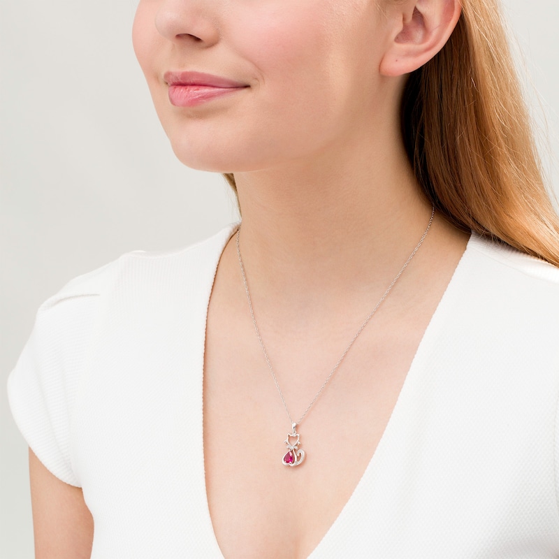 Pear-Shaped Lab-Created Ruby and 0.04 CT. T.W. Diamond Cat with Bow Tie Drop Pendant in Sterling Silver
