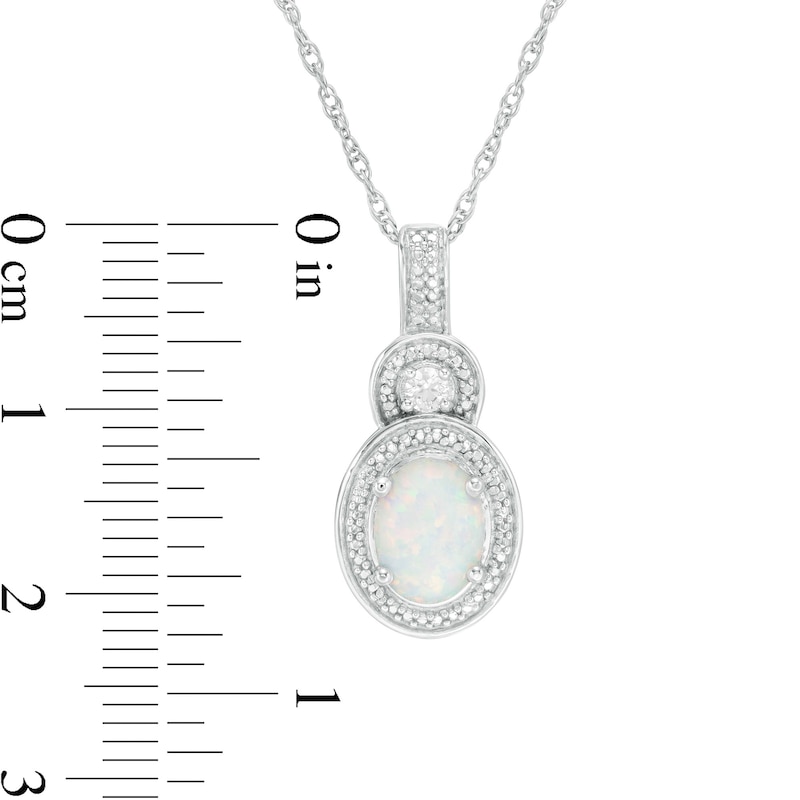 Oval Lab-Created Opal and White Sapphire Beaded Frame Buckle Drop Pendant in Sterling Silver