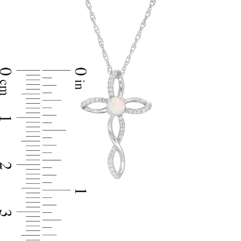 4.0mm Lab-Created Opal and 0.087 CT. T.W. Diamond Twisted Cross Pendant in Sterling Silver