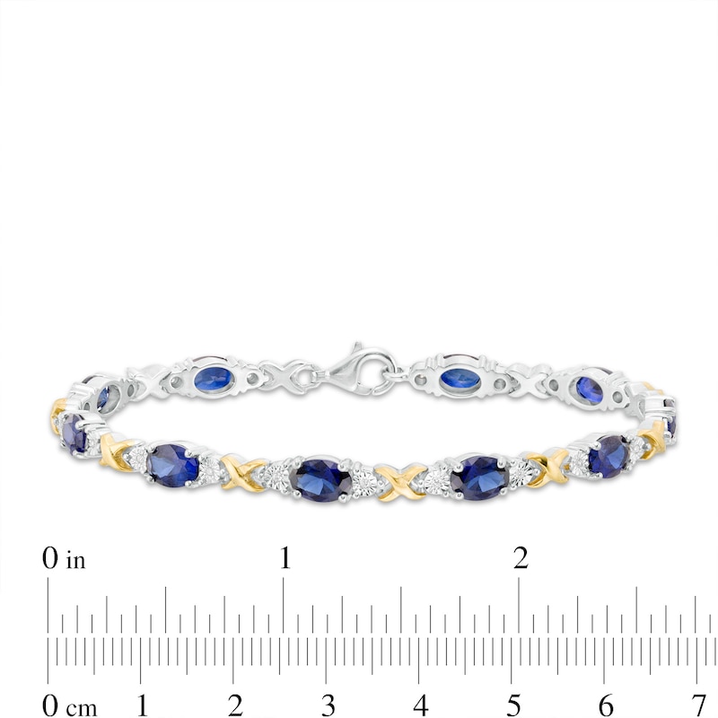 Oval Lab-Created Blue Sapphire and 0.086 CT. T.W. Diamond "X" Bracelet in Sterling Silver and 14K Gold Plate - 7.25"