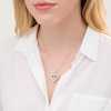 0.95 CT. T.W. Baguette and Round Diamond Double Row Heart Pendant in 10K Gold