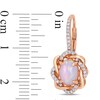 Thumbnail Image 2 of Oval Pink Opal and 0.24 CT. T.W. Diamond Twist Frame Drop Earrings in 10K Rose Gold