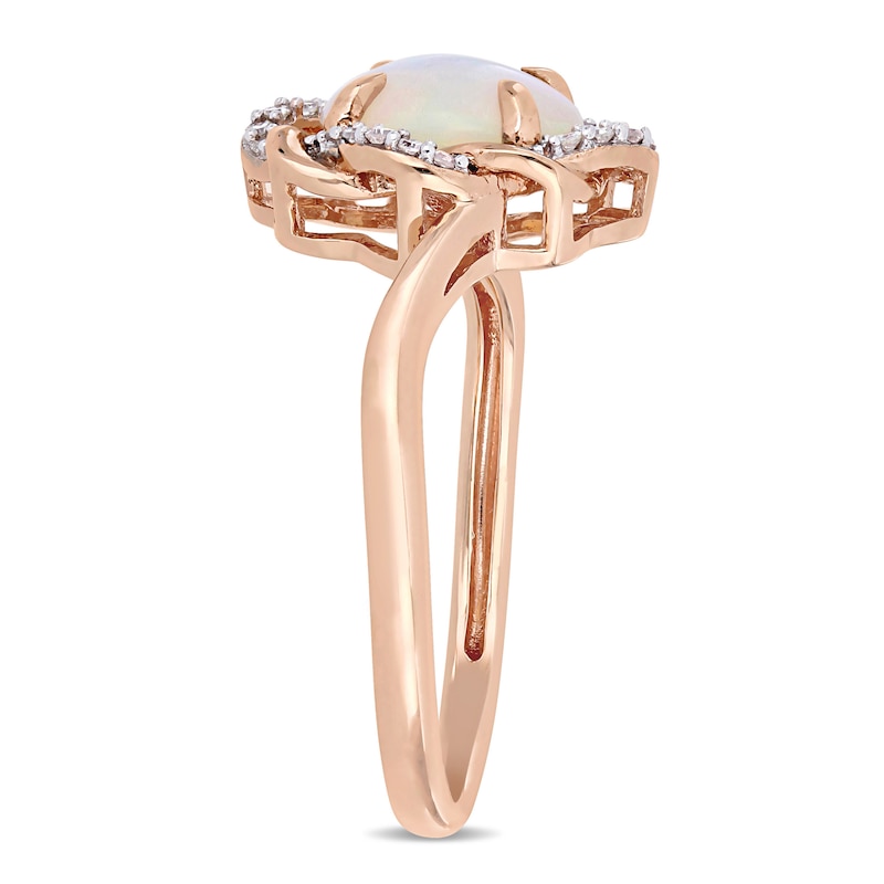 Oval Opal and 0.08 CT. T.W. Diamond Twist Frame Ring in 10K Rose Gold
