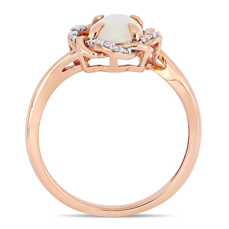 Oval Opal and 0.08 CT. T.W. Diamond Twist Frame Ring in 10K Rose Gold