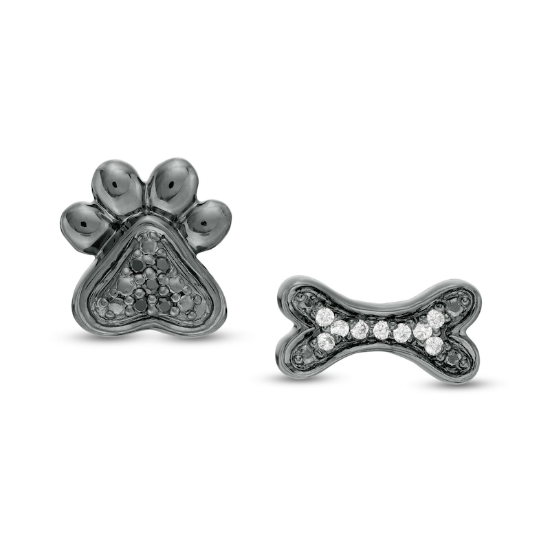 0.04 CT. T.W. Enhanced Black and White Diamond Bone and Paw Mismatch Stud Earrings in Sterling Silver with Black Rhodium