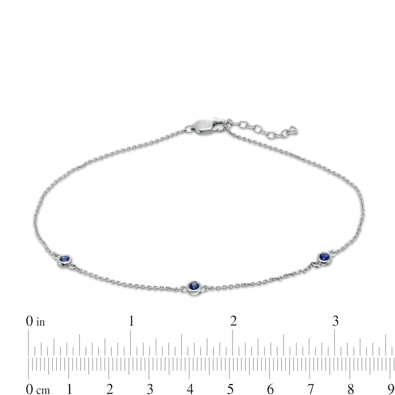 Main Image 3 of Bezel-Set Lab-Created Blue Sapphire Three Stone Station Anklet in Sterling Silver - 10"