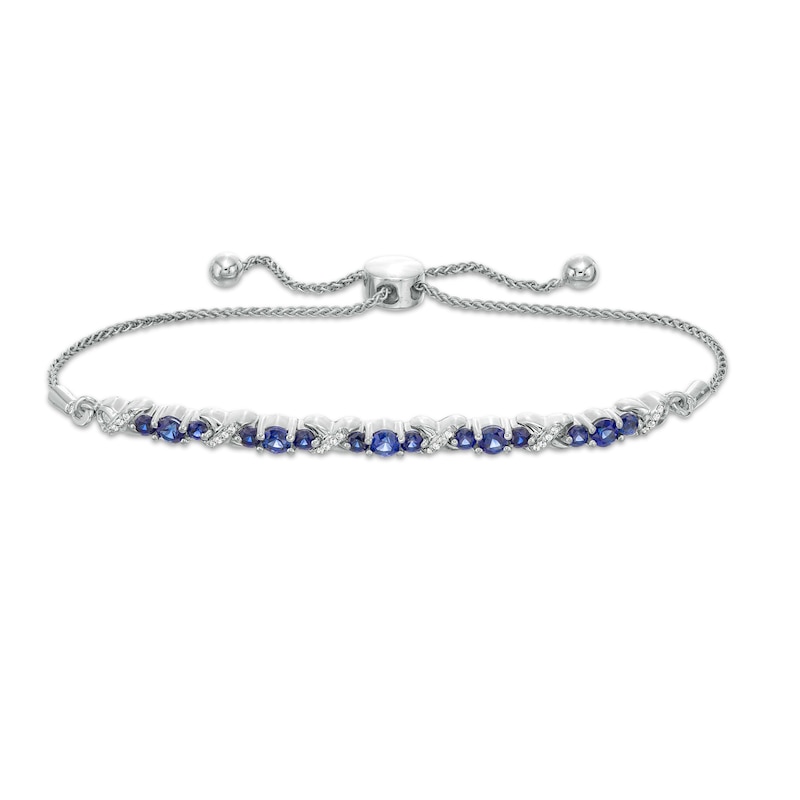 Lab-Created Blue Sapphire and 0.065 CT. T.W. Diamond Three Stone "X" and "O" Bolo Bracelet in Sterling Silver - 9.5"|Peoples Jewellers